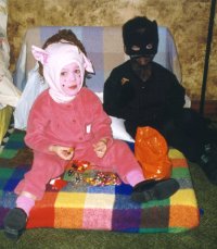 981031_PinkHorse&BlackPantherTrickOrTreating 200x229.jpg (13275 bytes)